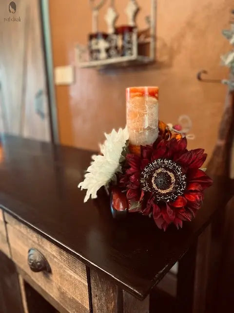 Fall decor featuring sunflowers and candles styled on barnwood kitchen island surface. Made by Red Cloak Wood Designs