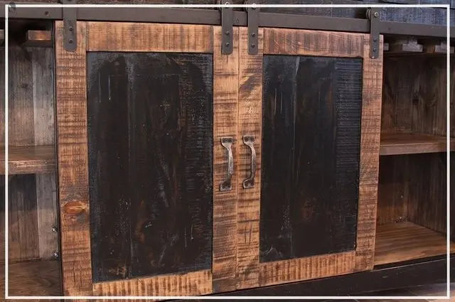 Sliding barn-style cabinet doors on rustic kitchen island with black and natural wood finish