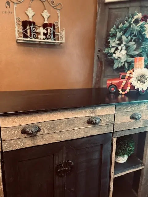 Close-up of dark stained wood top and rustic drawers on handmade kitchen island. Made by Red Cloak Wood Designs
