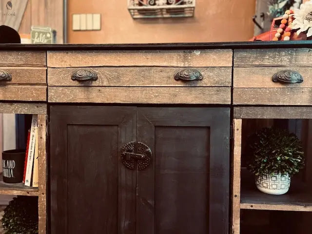Close-up view of rustic drawer pulls and textured wood grain on barnwood island. Made by Red Cloak Wood Designs