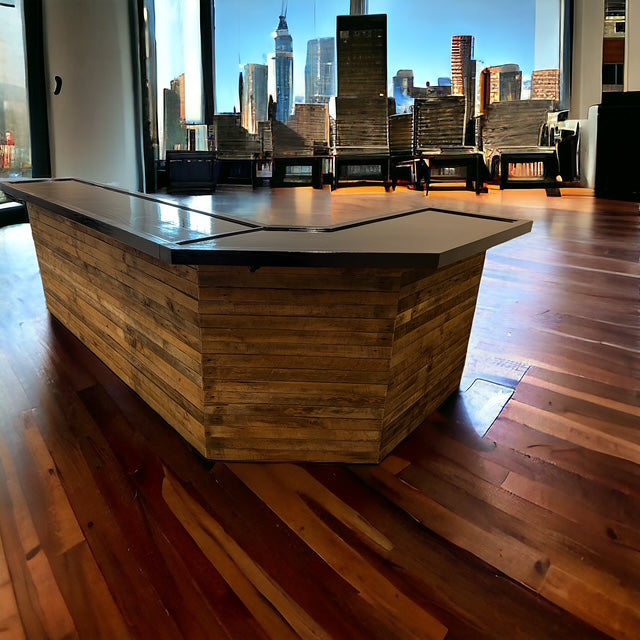 Custom corner wood bar by Red Cloak Home, reclaimed L shaped bar in modern urban loft with skyline views and rich hardwood floors