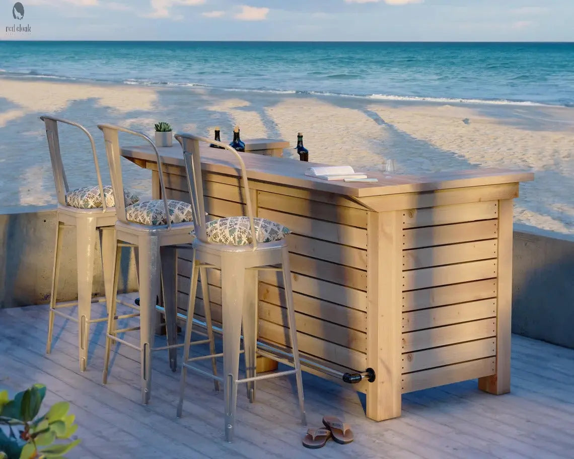 Smooth finish custom wood bar from Red Cloak Wood Designs set up on a beachside patio with barstools