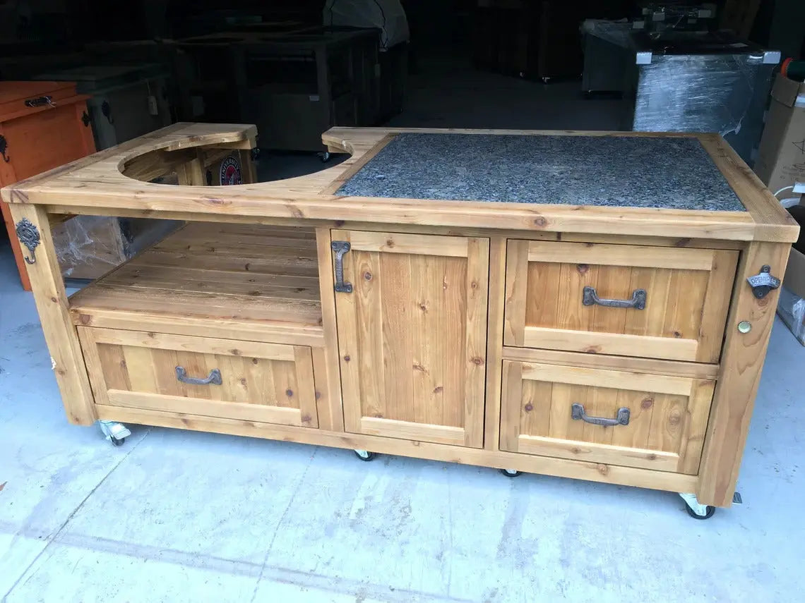 Unfinished Red Cloak grill cart with granite countertop and kamado slot, natural wood finish with drawers and storage shelf