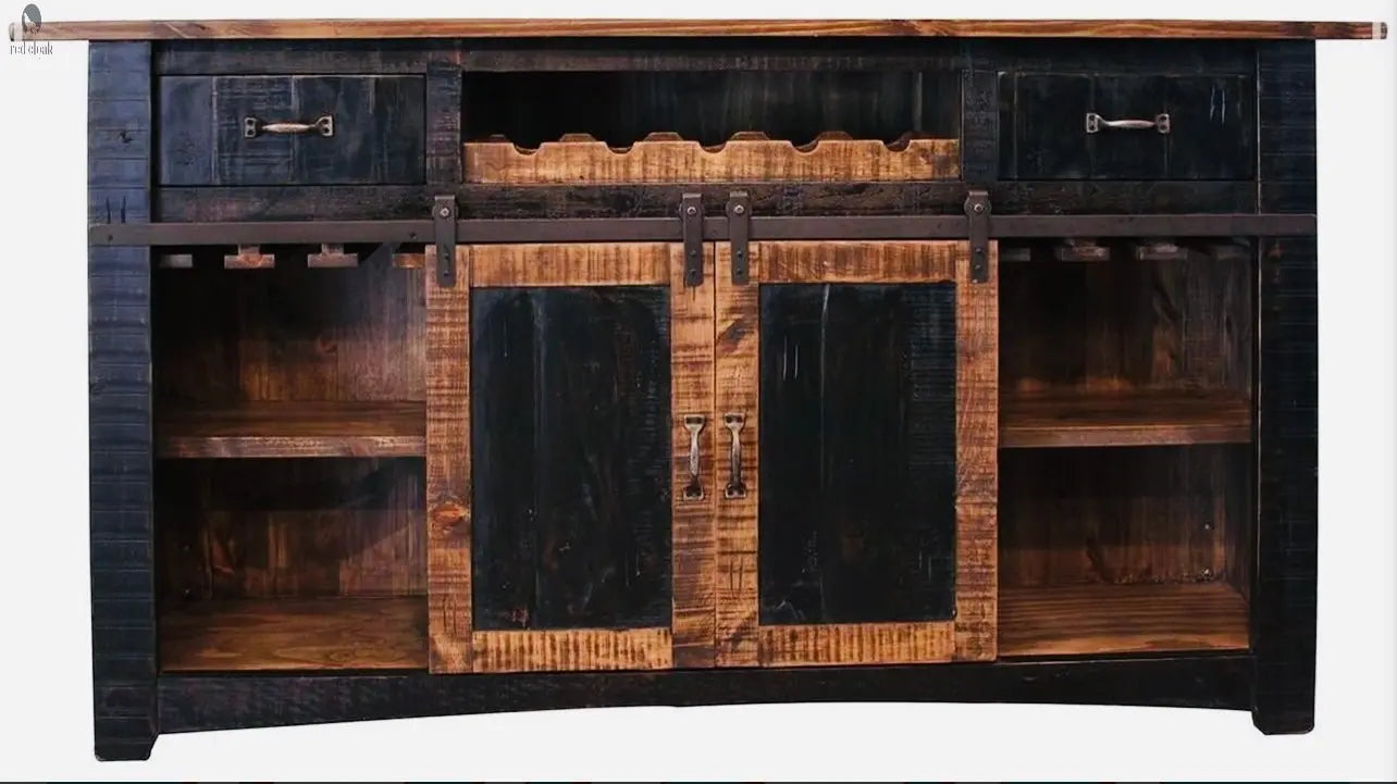Full front view of rustic kitchen island with wine storage, sliding doors, and black barnwood accents