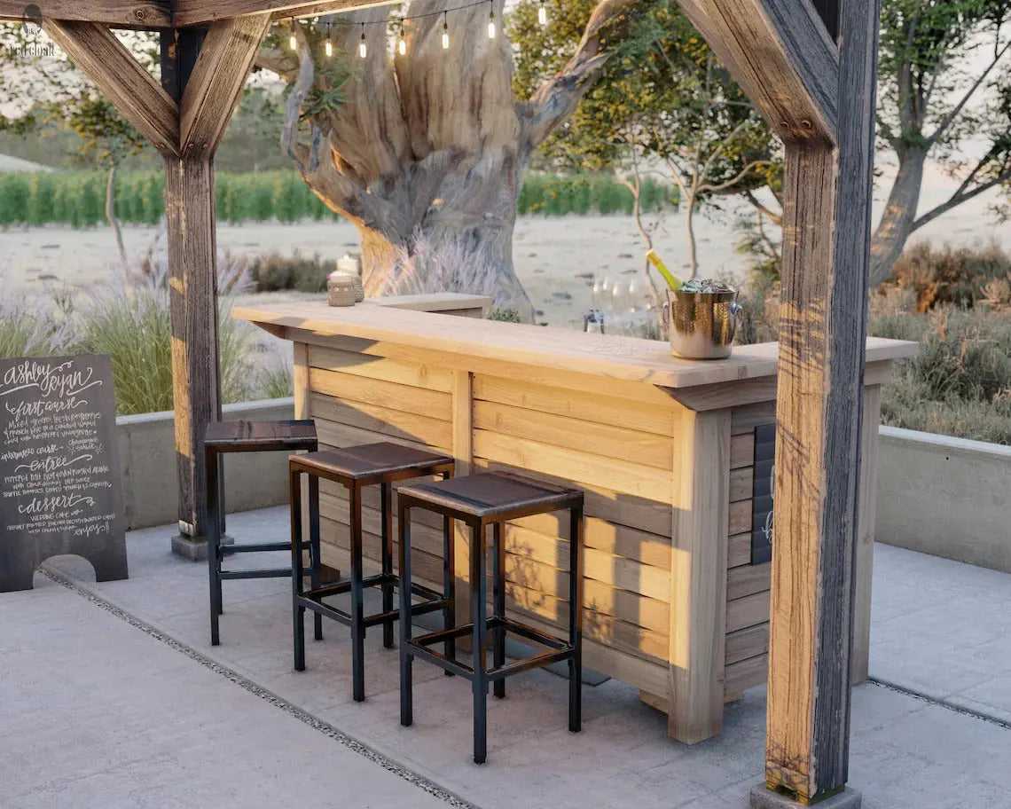 Custom wood bar by Red Cloak set under a pergola with string lighting, built for backyard entertaining and weddings