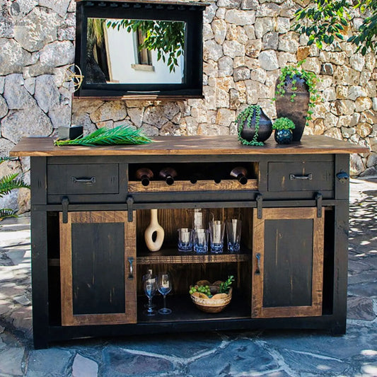 Rustic wood kitchen island staged outdoors with wine rack and glass storage, used as backyard bar setup