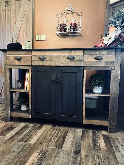 Rustic wood kitchen island with black base, open side shelves for books and plants, and authentic reclaimed wood drawers – Red Cloak Wood Designs