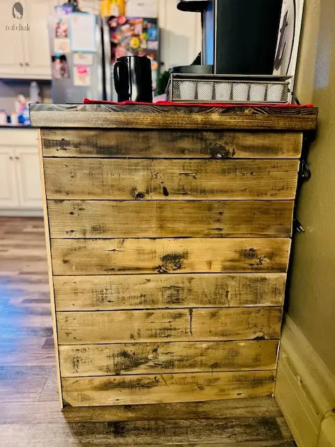 Wooden dresser with a rustic finish in a home setting