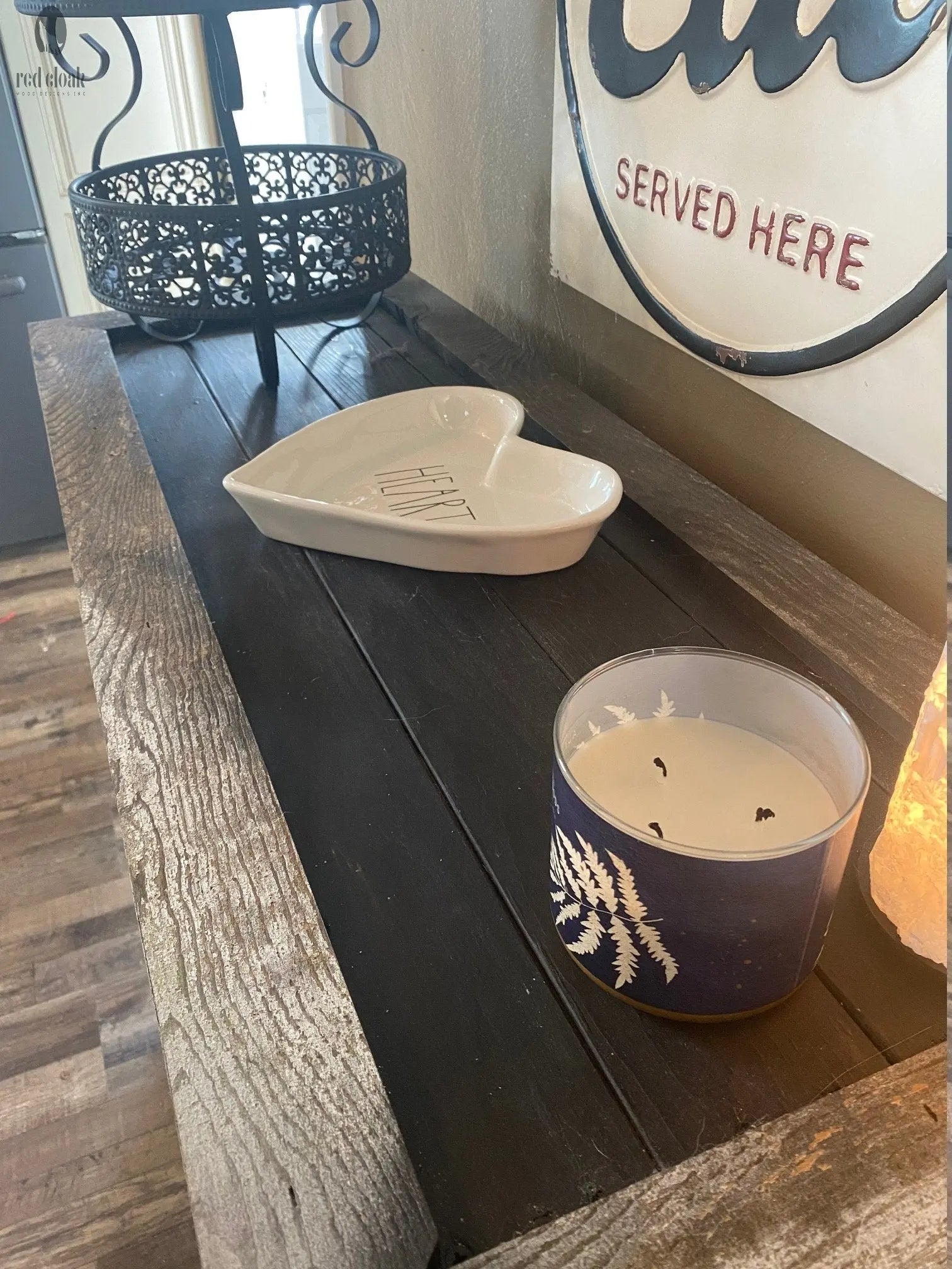 Closeup of dark stained black wood top on Red Cloak's reclaimed wood sofa table cabinet – handmade in Pennsylvania from 200-year-old barnwood.