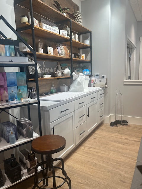 Built-in retail drawer and cabinet counter with white shiplap finish and open shelving, handcrafted by Red Cloak Wood Designs in Pennsylvania