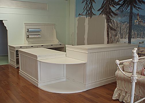 A white wooden checkout counter, cash wrap counter made from solid wood