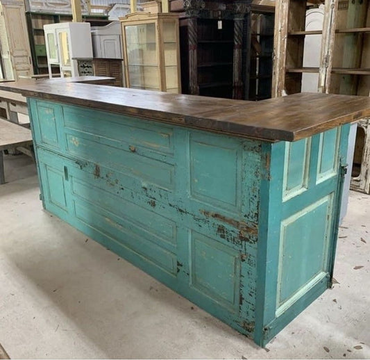 Turquoise reclaimed door cash wrap counter with distressed finish and dark wood countertop. Handmade by Red cloak Home