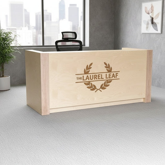 Modern birch reception desk with raised customer counter and custom logo panel in a professional office lobby. Handmade by Red Cloak Home