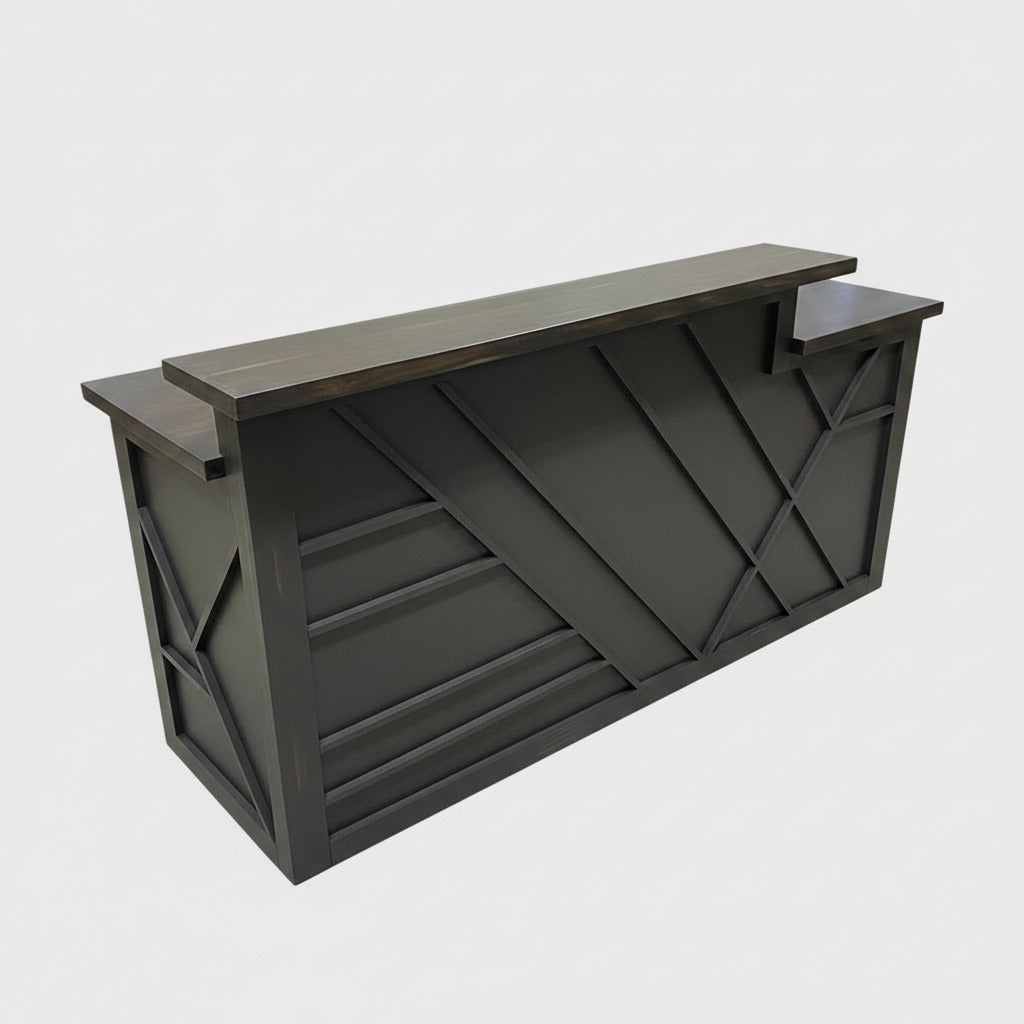 Dark gray custom reception desk with geometric front panels and raised customer transaction counter. Handmade by Red Cloak Home