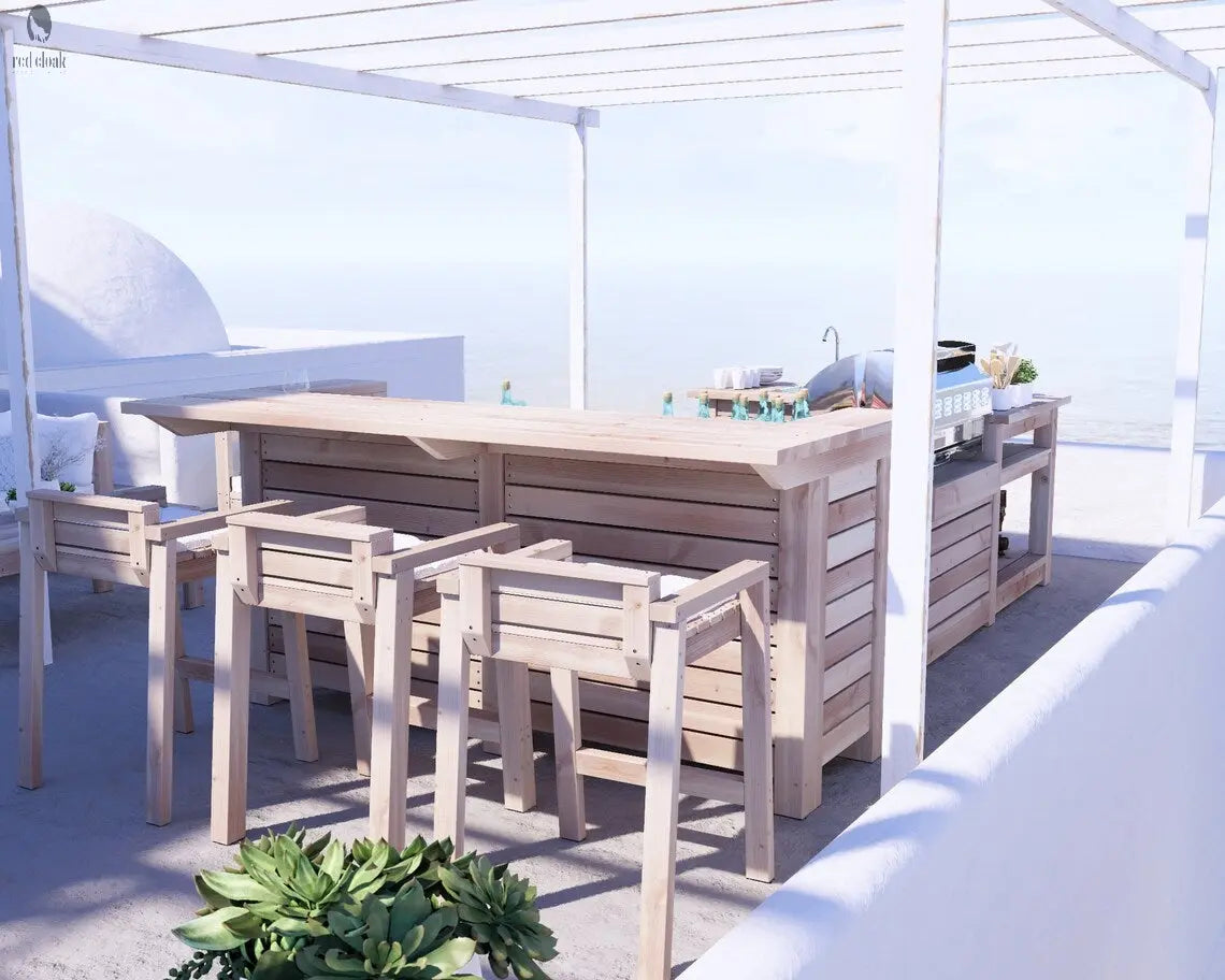 Back view of Red Cloak’s outdoor kitchen showing counter overhang and seating area with stools