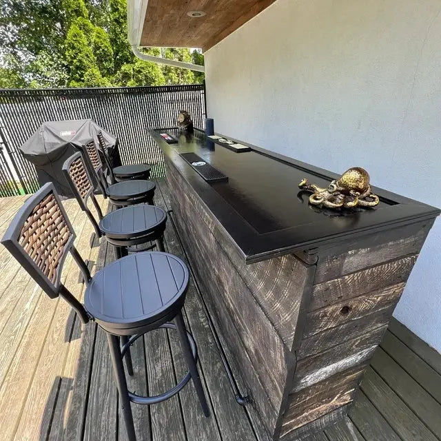 Custom outdoor bar built from dark-finished reclaimed barn wood, designed by Red Cloak Home