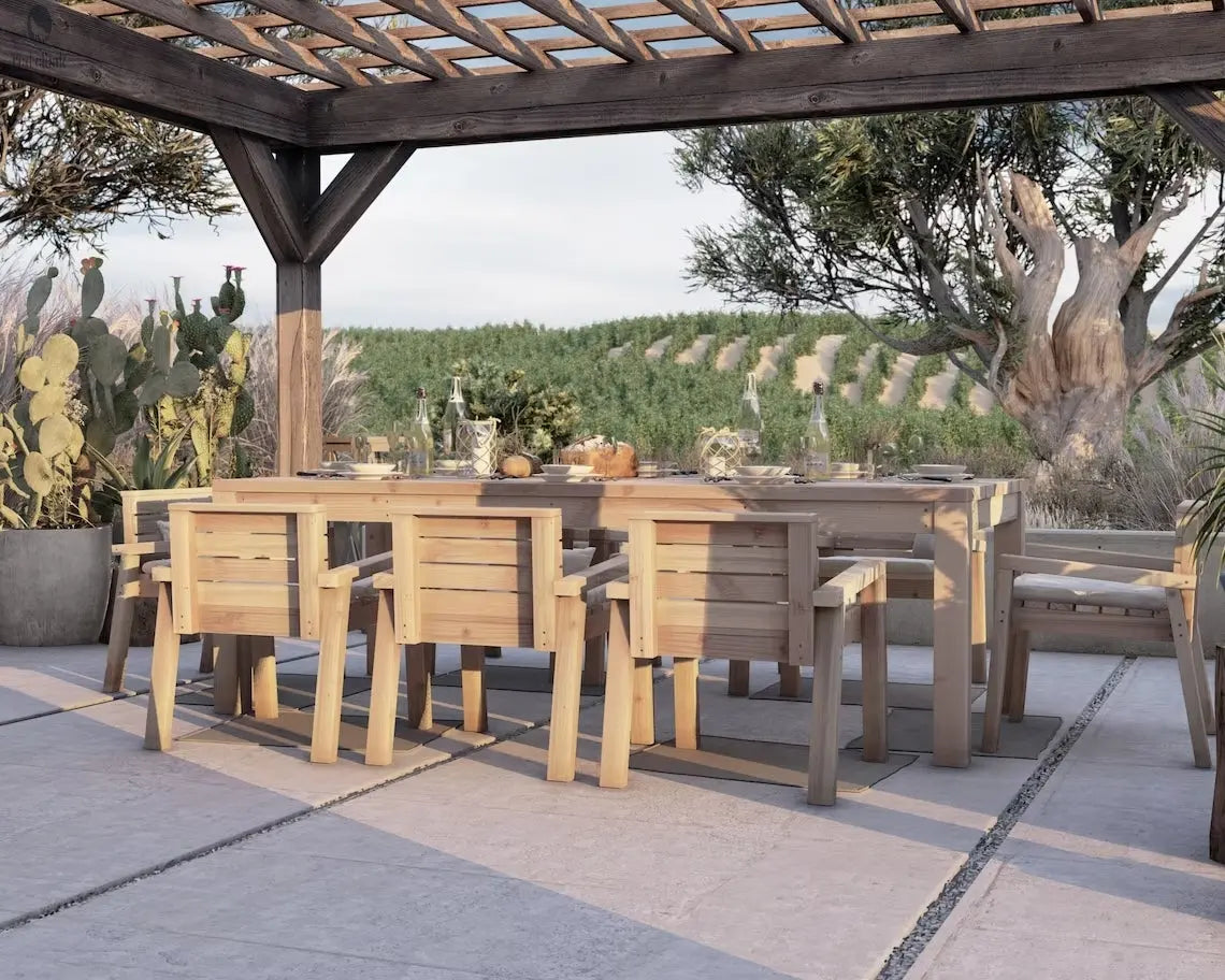 Solid wood dining table set with white-cushioned chairs, styled for outdoor entertaining with a natural farmhouse vibe