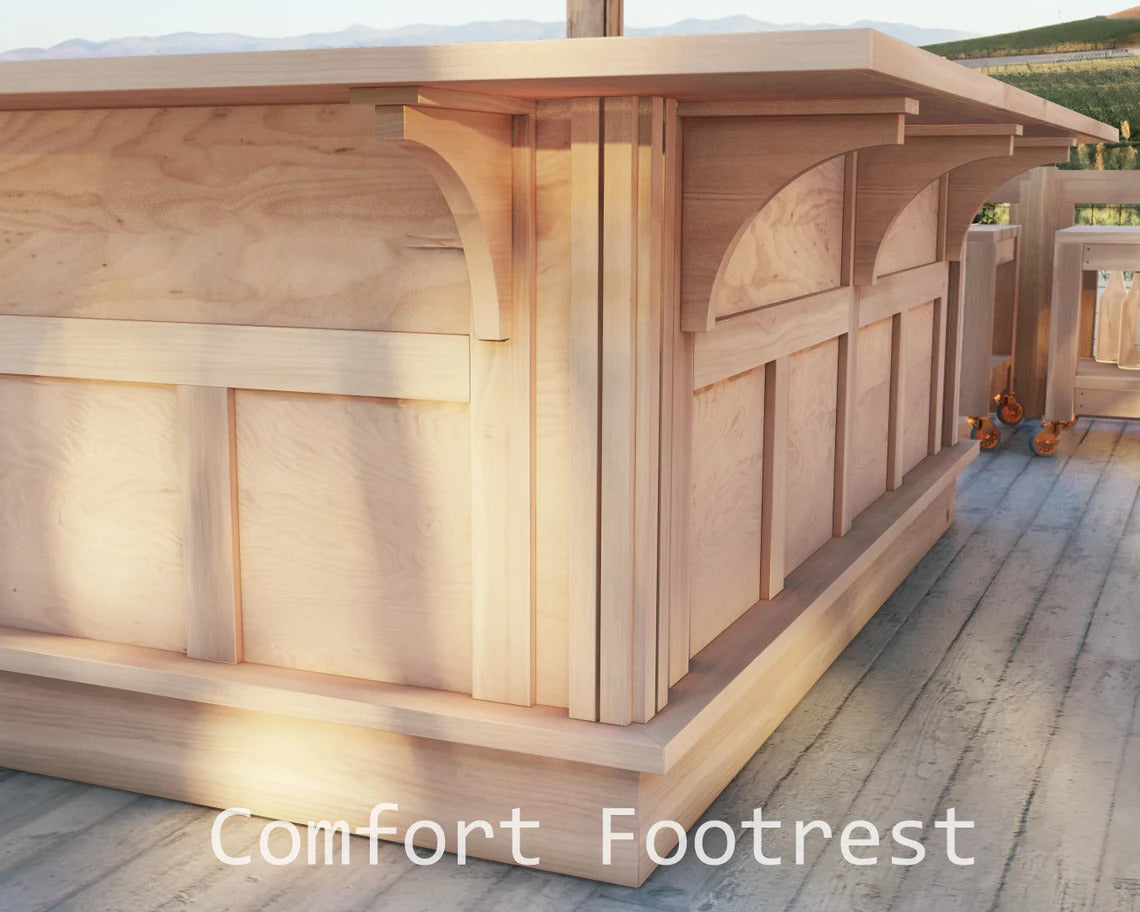 U shaped wood bar with built in footrest detail and solid wood paneling, close up of outdoor home bar base designed for comfort seating and long hosting nights