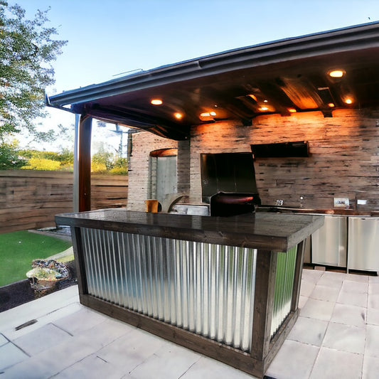 Outdoor bar by Red Cloak Home featuring dark reclaimed wood and galvanized metal under a custom patio cover